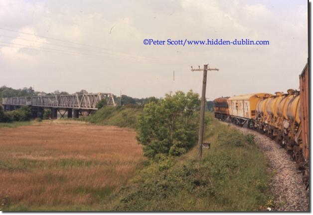 159 approaches the old red iron bridge waterford, picture copyright Peter Scott